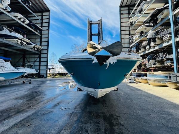 Slide: The Image of 2025 Sea Ray 270 SDX boat in storage facility, front view. - 3