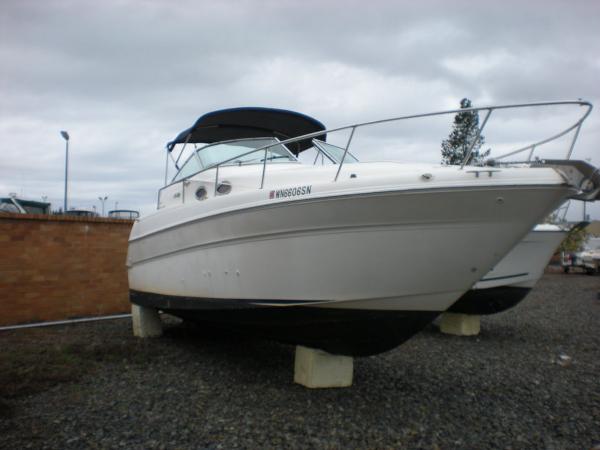 Slide: The Image of 1998 Sea Ray Sundancer 270 boat on dry dock. - 5