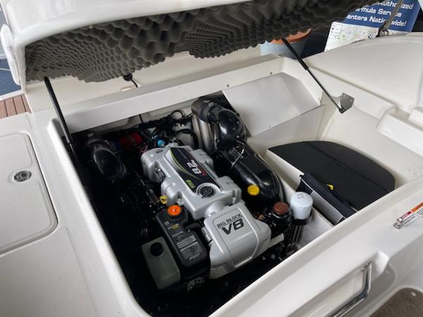 Slide: The Image of 2014 Sea Ray 280 Sundeck engine compartment with V8 engine. - 11