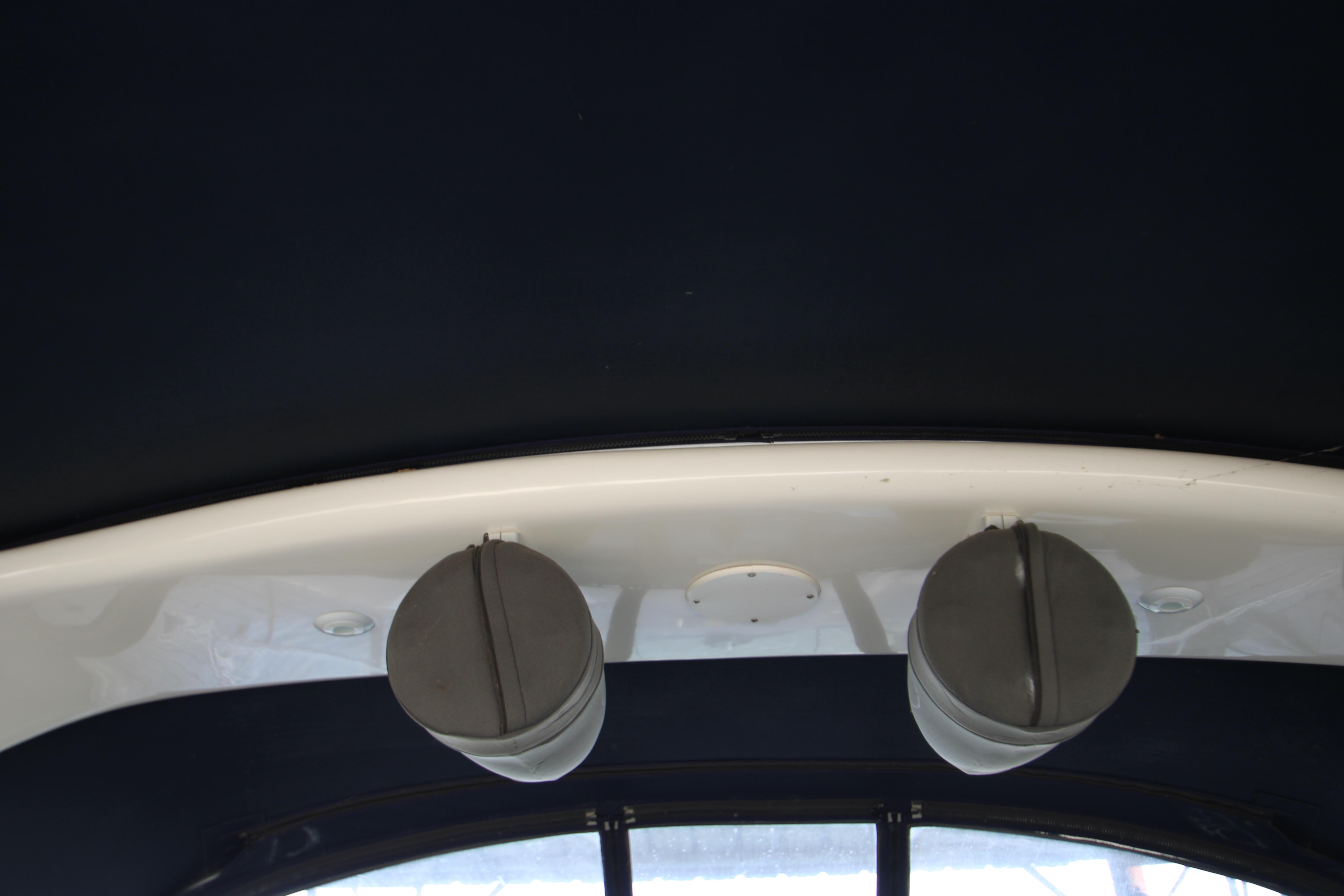 Slide: The Image of Interior view of 2003 Sea Ray 320 Sundancer boat ceiling with speakers. - 31