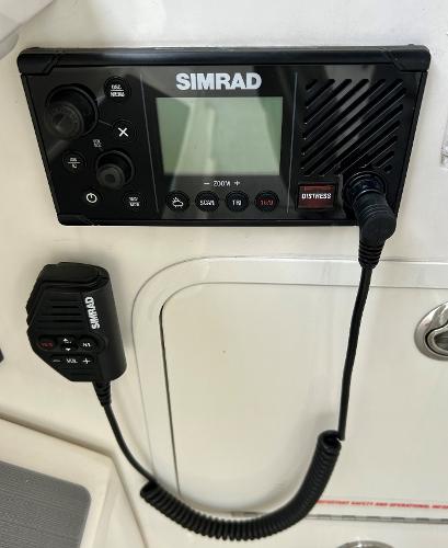 Slide: The Image of Simrad marine radio on 2021 Sea Ray 320 Sundancer boat. - 18