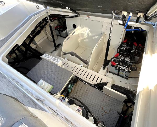Slide: The Image of Engine compartment of a 2021 Sea Ray 320 Sundancer boat. - 46