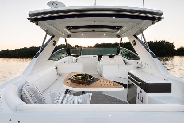 Slide: The Image of 2023 Sea Ray Sundancer 320 luxury yacht interior with spacious seating and elegant design. - 15