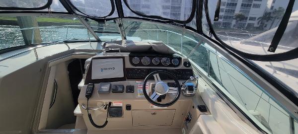Slide: The Image of 2008 Sea Ray 350 Sundancer boat helm with navigation system and controls. - 14