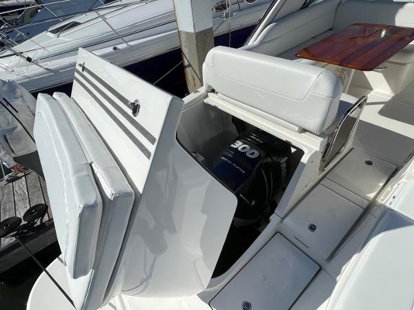 Slide: The Image of 2015 Sea Ray 370 Venture boat with open engine compartment. - 13