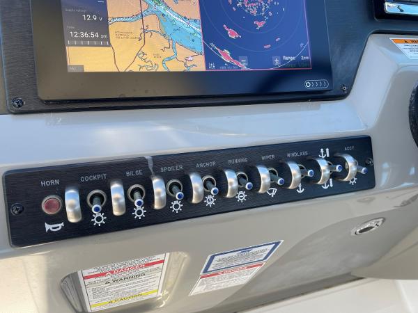 Slide: The Image of Control panel of a 2015 Sea Ray 370 Venture boat with navigation display. - 17