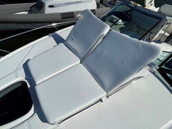 Slide: The Image of Sun loungers on the deck of a 2015 Sea Ray 370 Venture boat. - 23