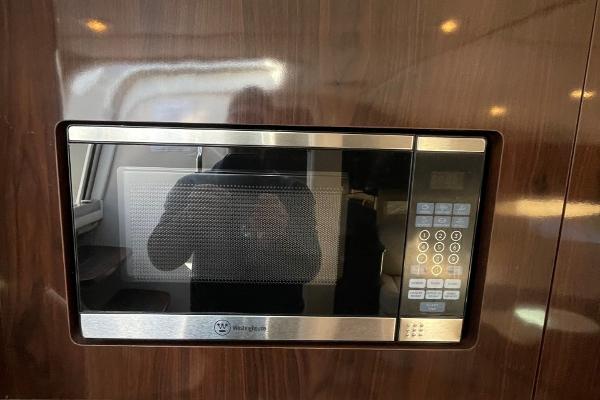 Slide: The Image of Built-in microwave in 2015 Sea Ray 370 Venture yacht kitchen. - 34
