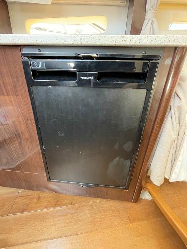 Slide: The Image of Built-in refrigerator in the 2015 Sea Ray 370 Venture yacht kitchen. - 35