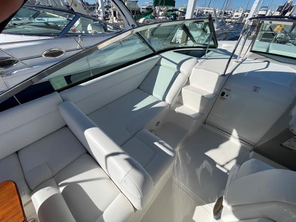 Slide: The Image of 2015 Sea Ray 370 Venture boat interior with white leather seating. - 6