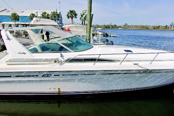 Slide: The Image of 1992 Sea Ray 400 Express Cruiser docked at marina. - 0