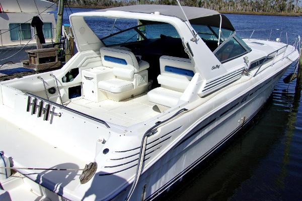 Slide: The Image of 1992 Sea Ray 400 Express Cruiser docked, rear view. - 2