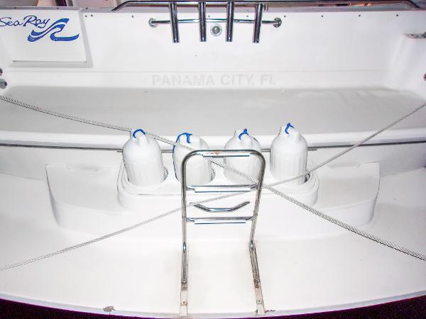 Slide: The Image of 1992 Sea Ray 400 Express Cruiser stern with ladder and fenders, Panama City, FL. - 5