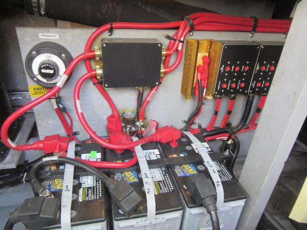 Slide: The Image of Electrical system of a 1995 Sea Ray 400 Express Cruiser with batteries and wiring. - 44