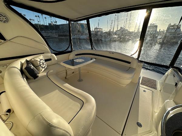 Slide: The Image of Luxurious interior of 2005 Sea Ray 420 Sundancer yacht with marina view. - 18