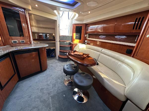 Slide: The Image of Luxurious 2005 Sea Ray 420 Sundancer yacht interior with elegant seating and modern amenities. - 37