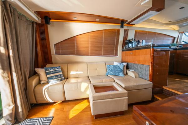 Slide: The Image of Luxurious interior of 2015 Sea Ray 510 Fly yacht with beige leather seating. - 12