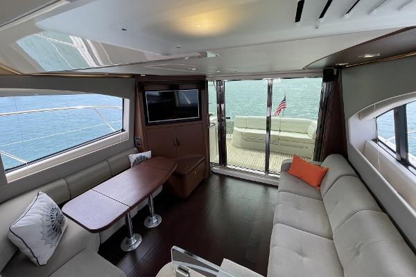 Slide: The Image of Luxurious interior of 2015 Sea Ray 510 Fly yacht with spacious seating and ocean view. - 13