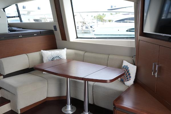 Slide: The Image of Luxurious interior of 2015 Sea Ray 510 Fly yacht with elegant seating and table. - 16
