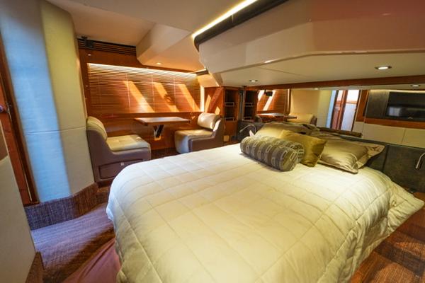 Slide: The Image of Luxurious interior of 2015 Sea Ray 510 Fly yacht with cozy bed and seating area. - 16