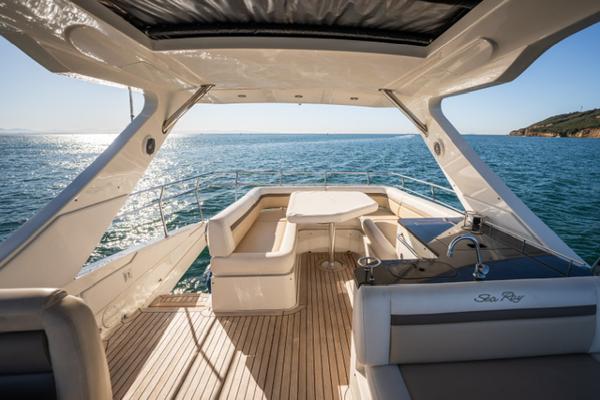 Slide: The Image of 2015 Sea Ray 510 Fly yacht with spacious deck and ocean view. - 7