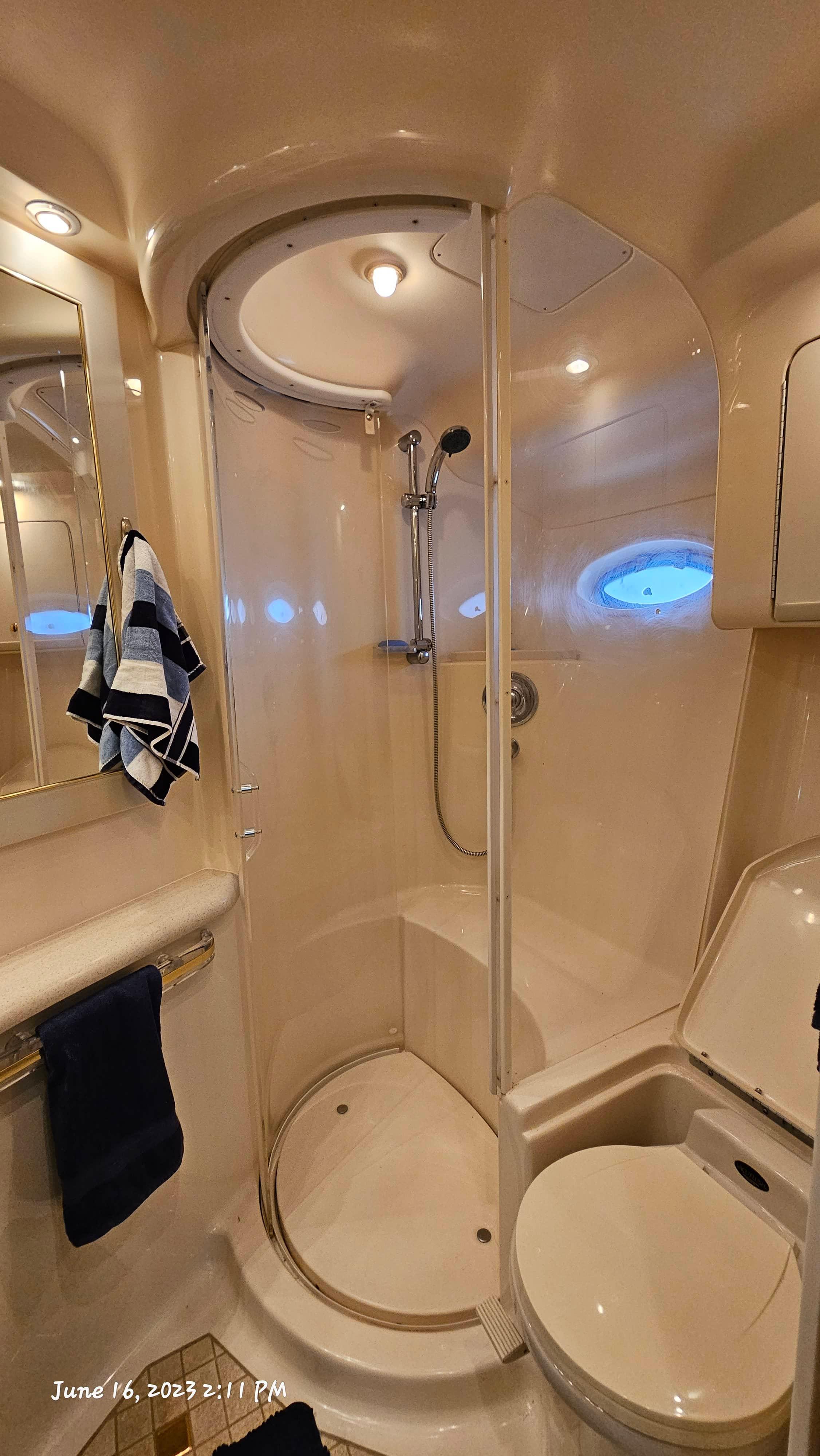 Slide: The Image of Bathroom of 1999 Sea Ray 540 Sundancer yacht with shower and toilet. - 10