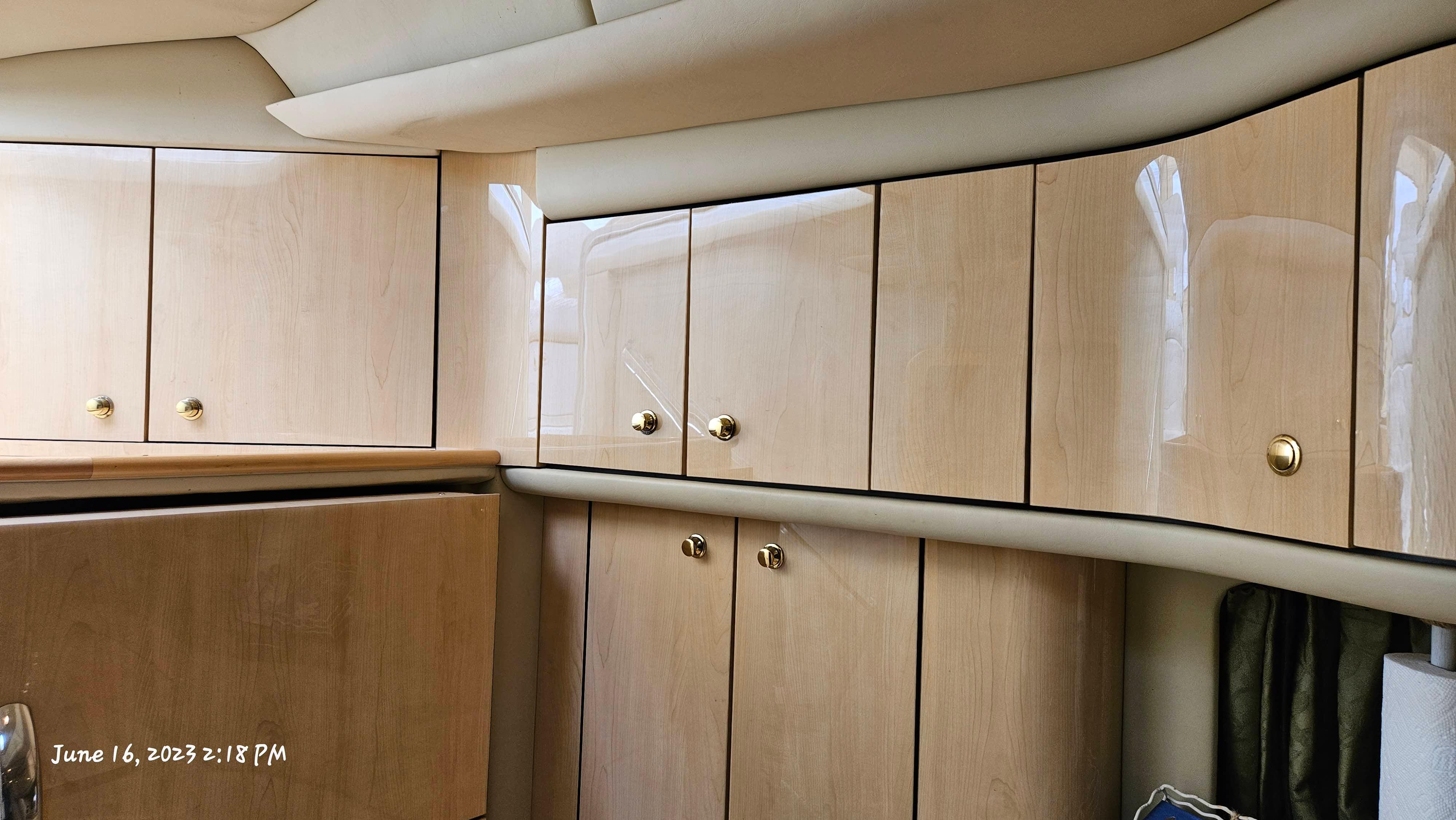 Slide: The Image of Interior cabinetry of a 1999 Sea Ray 540 Sundancer yacht. - 17