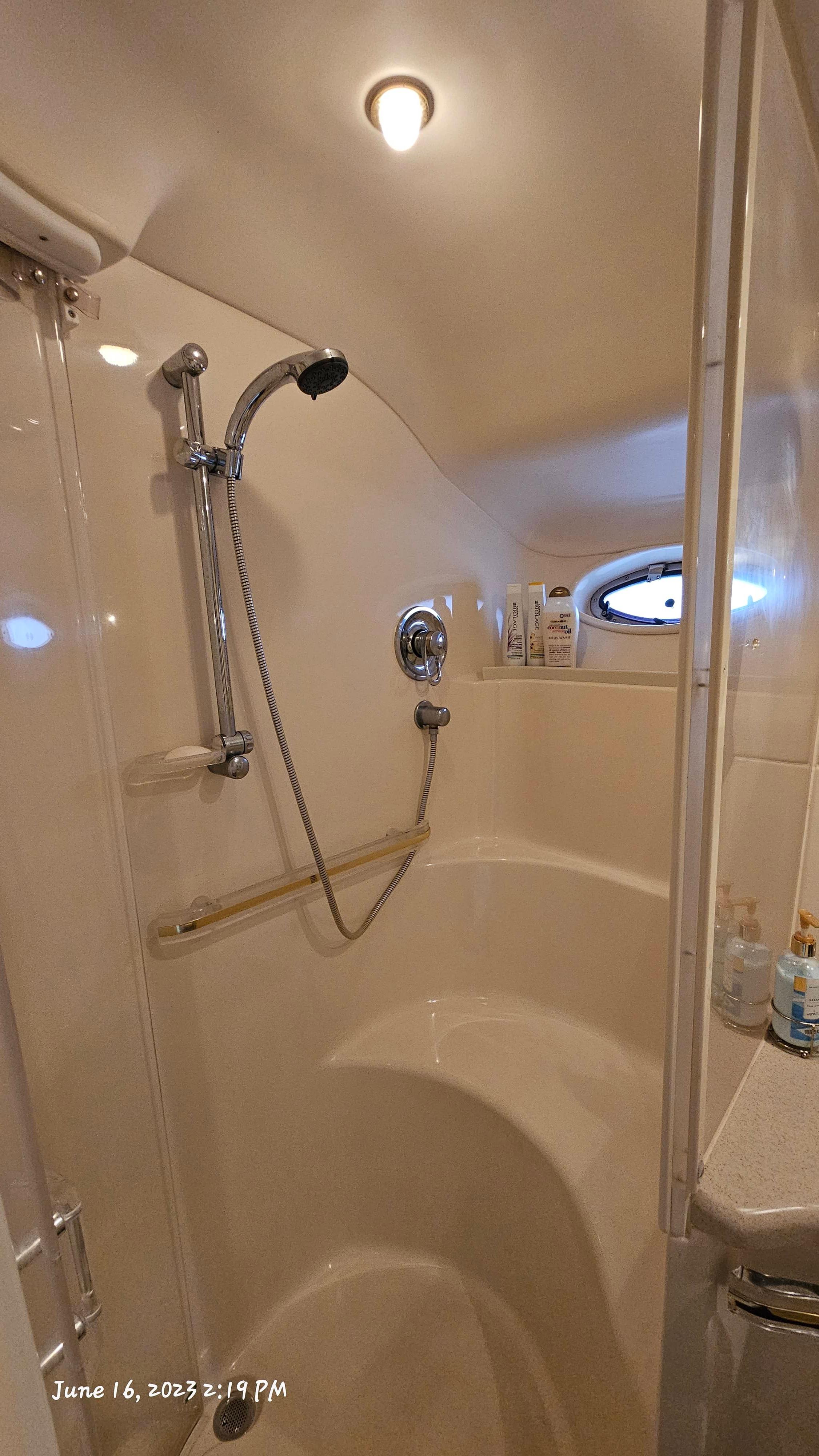 Slide: The Image of Bathroom shower area in a 1999 Sea Ray 540 Sundancer yacht. - 21