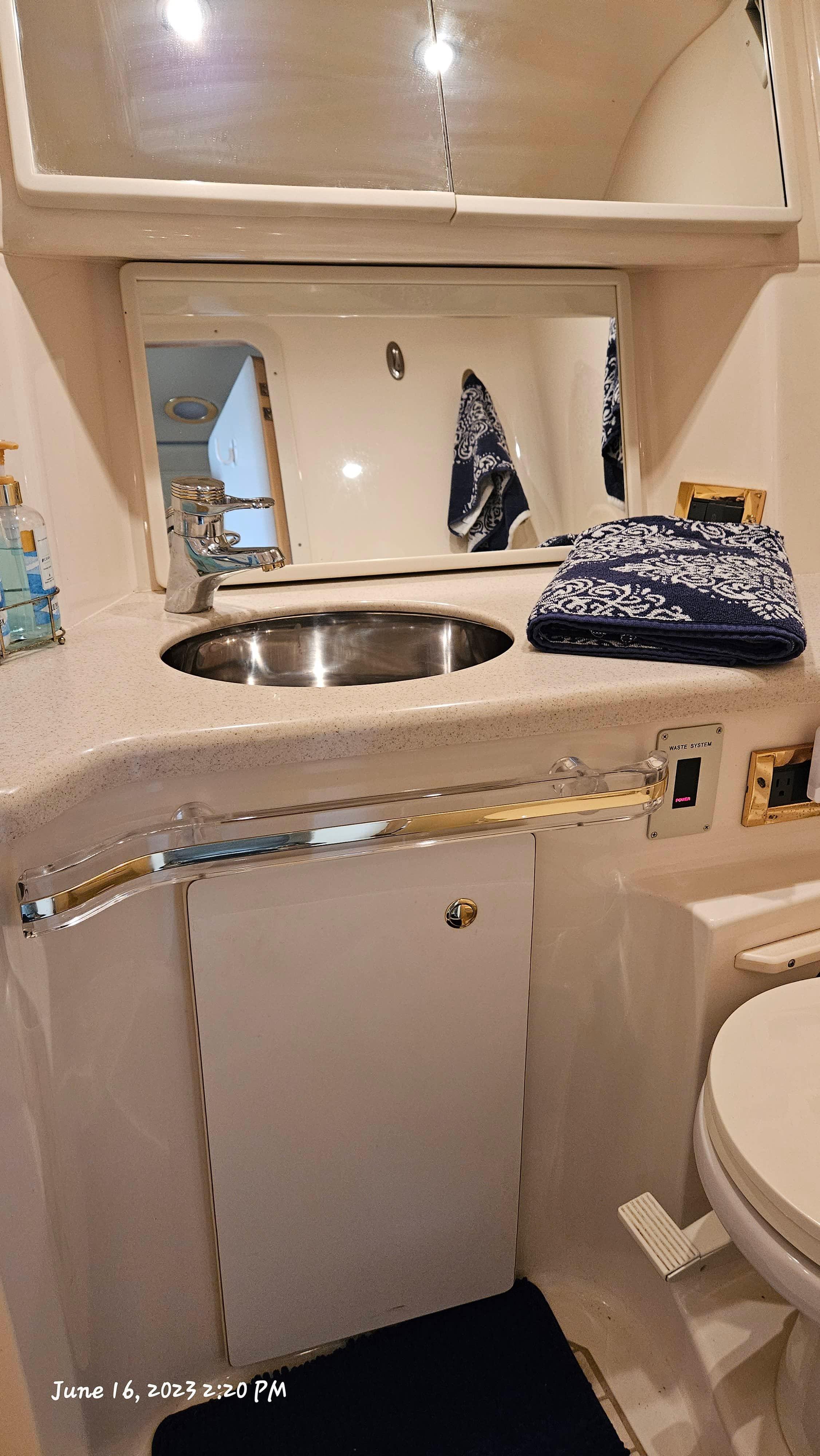 Slide: The Image of Bathroom sink area in a 1999 Sea Ray 540 Sundancer yacht. - 22