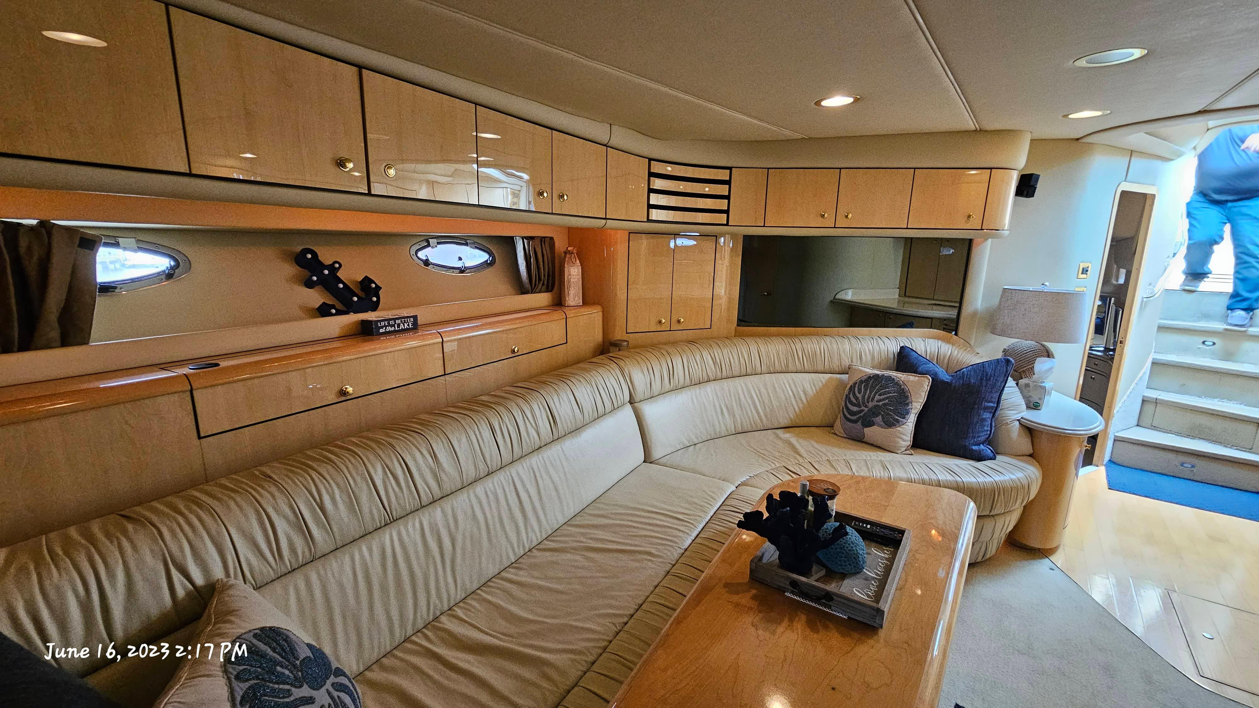 Slide: The Image of Luxurious interior of 1999 Sea Ray 540 Sundancer yacht with beige leather seating. - 3