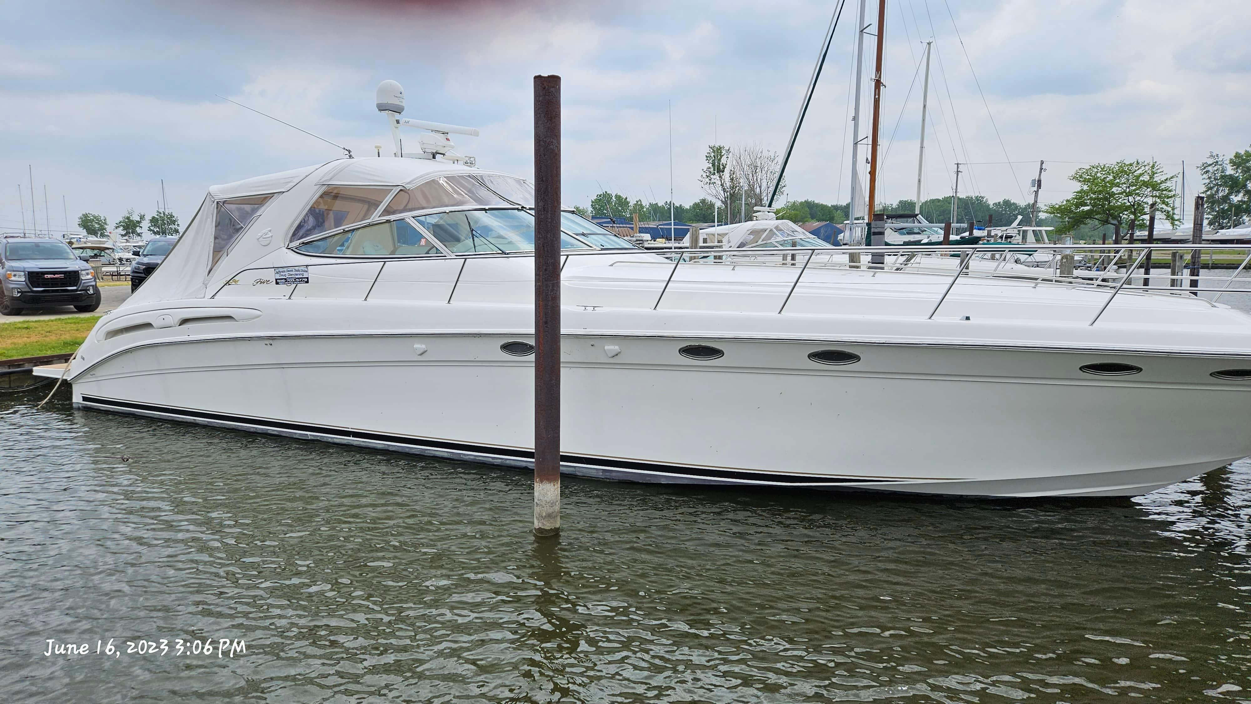 Slide: The Image of 1999 Sea Ray 540 Sundancer yacht docked at a marina on June 16, 2023. - 45