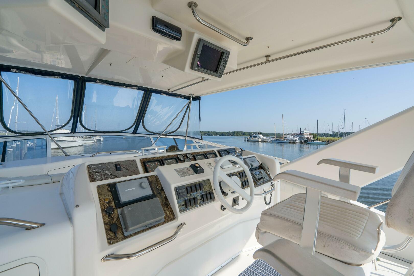 Slide: The Image of 1997 55 Sea Ray 550 Sedan No Name Upper Helm (1) - 3905930