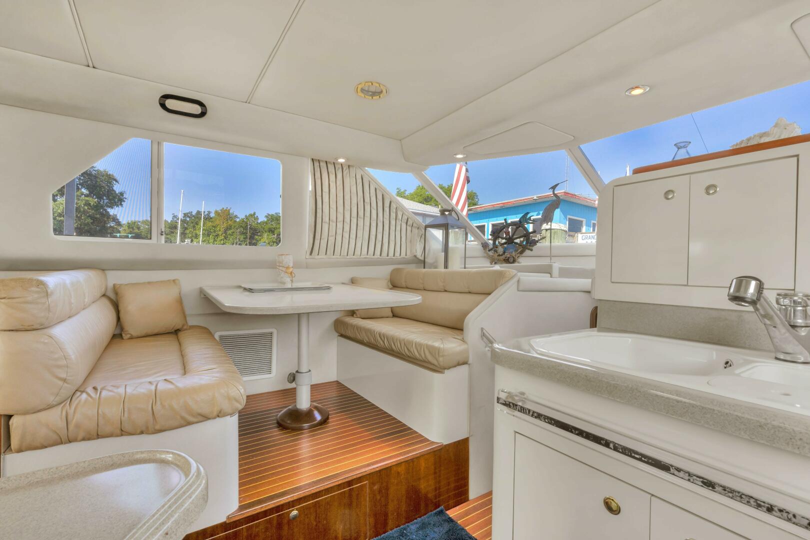 Slide: The Image of 1997 55 Sea Ray 550 Sedan No Name Dinette - 3905924