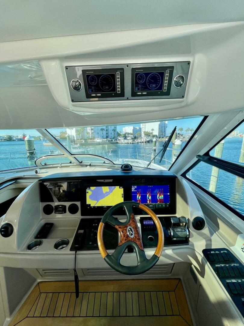 Slide: The Image of 2008 Sea Ray 55 Sundancer POSITIVE VIBES Helm (2) - 4003376