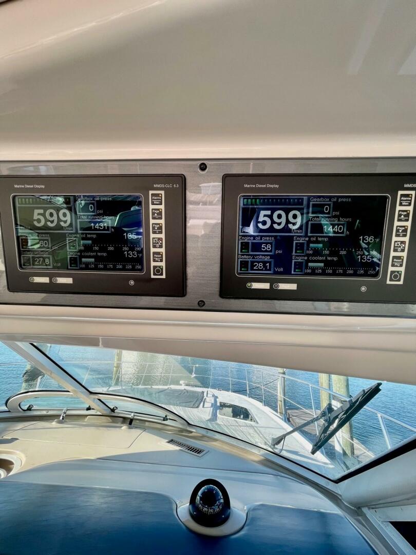 Slide: The Image of 2008 Sea Ray 55 Sundancer POSITIVE VIBES Helm (4) - 4003378
