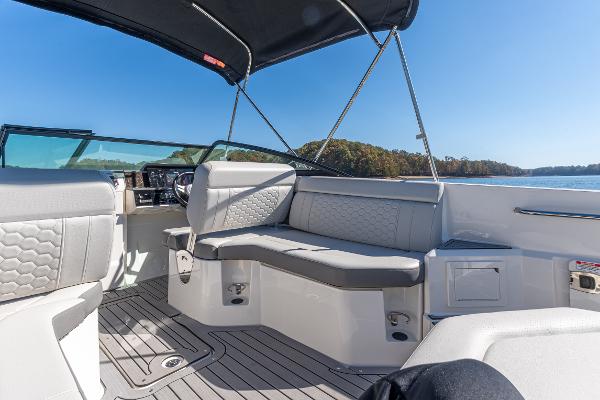 Slide: The Image of 2021 Sea Ray SDX 250 boat interior with sleek seating and modern design. - 13