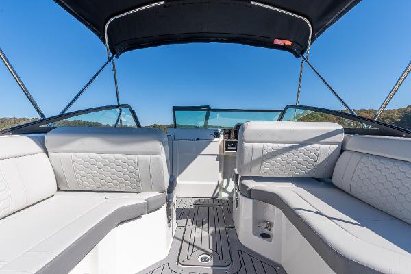 Slide: The Image of 2021 Sea Ray SDX 250 boat interior with spacious seating and sleek design. - 14