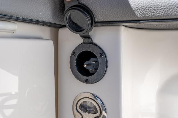 Slide: The Image of 2021 Sea Ray SDX 250 boat power outlet and socket detail. - 15