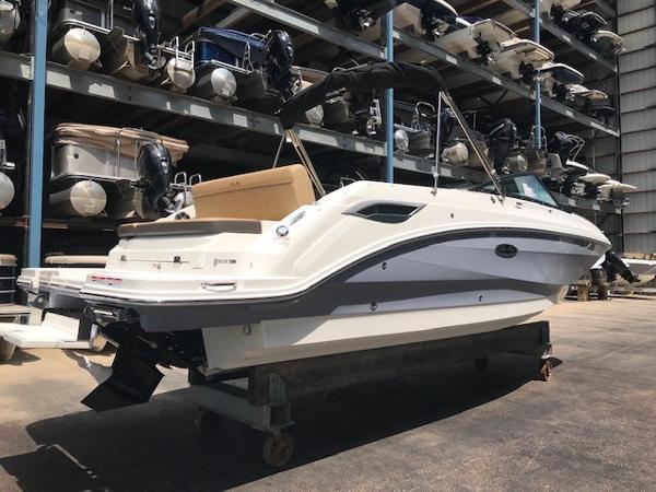 Slide: The Image of 2025 Sea Ray SDX 250 boat in storage facility, side view. - 1