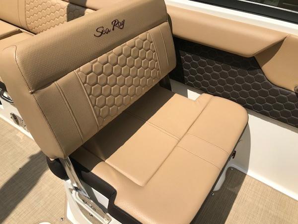 Slide: The Image of 2025 Sea Ray SDX 250 boat seat with tan upholstery and hexagonal pattern. - 13