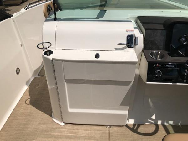 Slide: The Image of 2025 Sea Ray SDX 250 boat interior with helm station and control panel. - 17