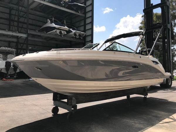 Slide: The Image of 2025 Sea Ray SDX 250 boat in storage facility, side view. - 4
