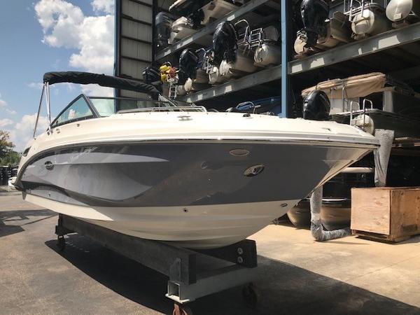 Slide: The Image of 2025 Sea Ray SDX 250 boat in storage, showcasing sleek design and modern features. - 6