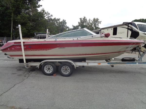 Slide: The Image of 1988 Sea Ray Seville 20 Bow Rider on a trailer. - 12