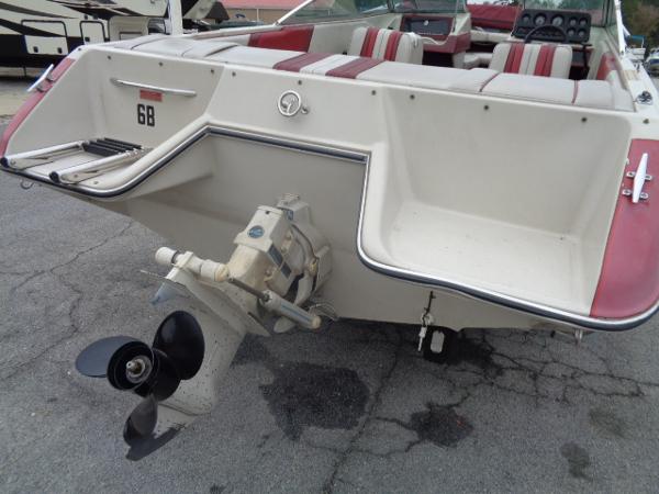 Slide: The Image of 1988 Sea Ray Seville 20 Bow Rider, rear view with outboard motor and seating. - 14