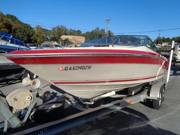 Slide: The Image of 1988 Sea Ray Seville 20 Bow Rider on trailer, red and white exterior. - 19