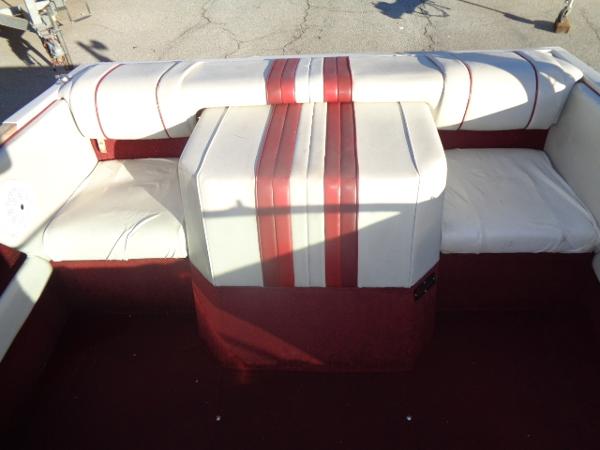 Slide: The Image of 1988 Sea Ray Seville 20 Bow Rider interior with white and red seating. - 25