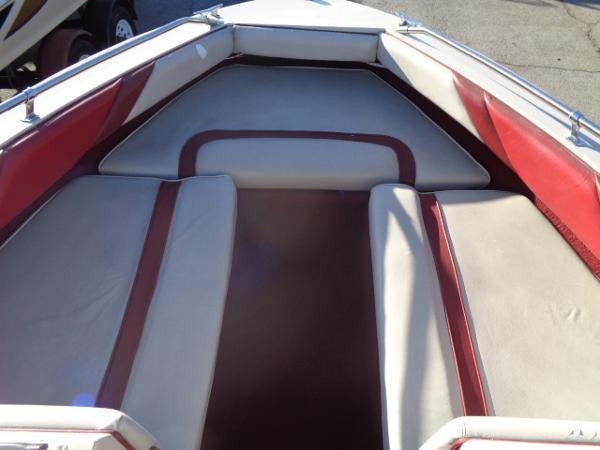 Slide: The Image of 1988 Sea Ray Seville 20 Bow Rider interior with red and white seating. - 27