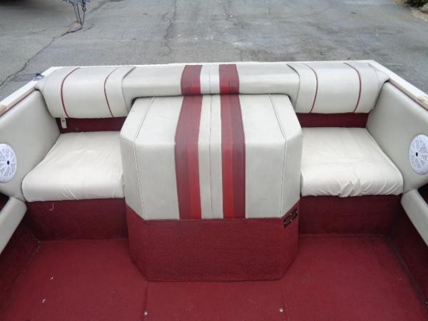 Slide: The Image of 1988 Sea Ray Seville 20 Bow Rider interior with red and white upholstery. - 3