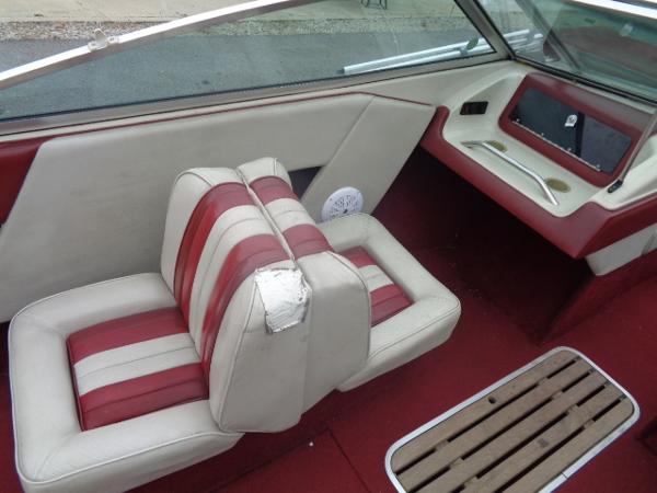Slide: The Image of 1988 Sea Ray Seville 20 Bow Rider interior with red and white seats. - 5